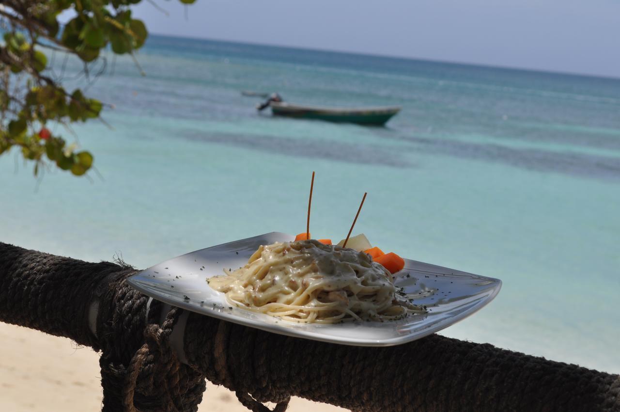 Paradise Island Beach Resort Punta Rucia Buitenkant foto